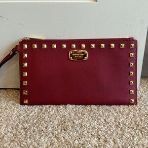 Michael Kors studded red wristlet